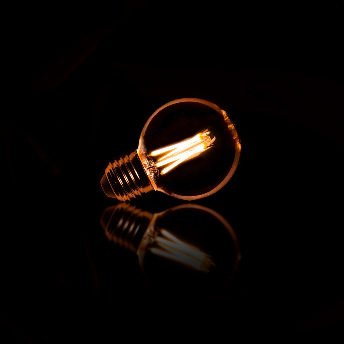 LED-Leuchtmittel Filament Kugel Ø 6 cm – Bernsteinglas – Bild 2
